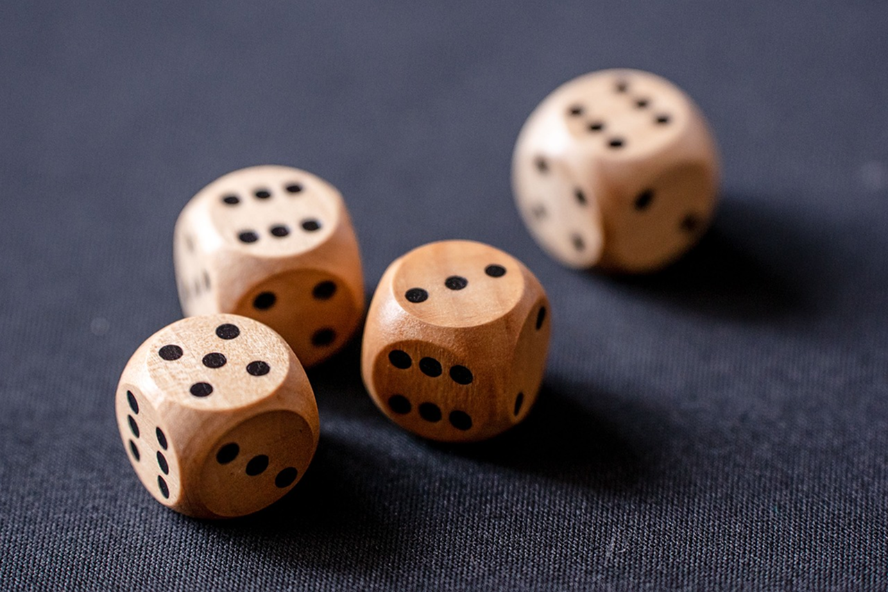 Wooden dice image after the large centered watermark is removed